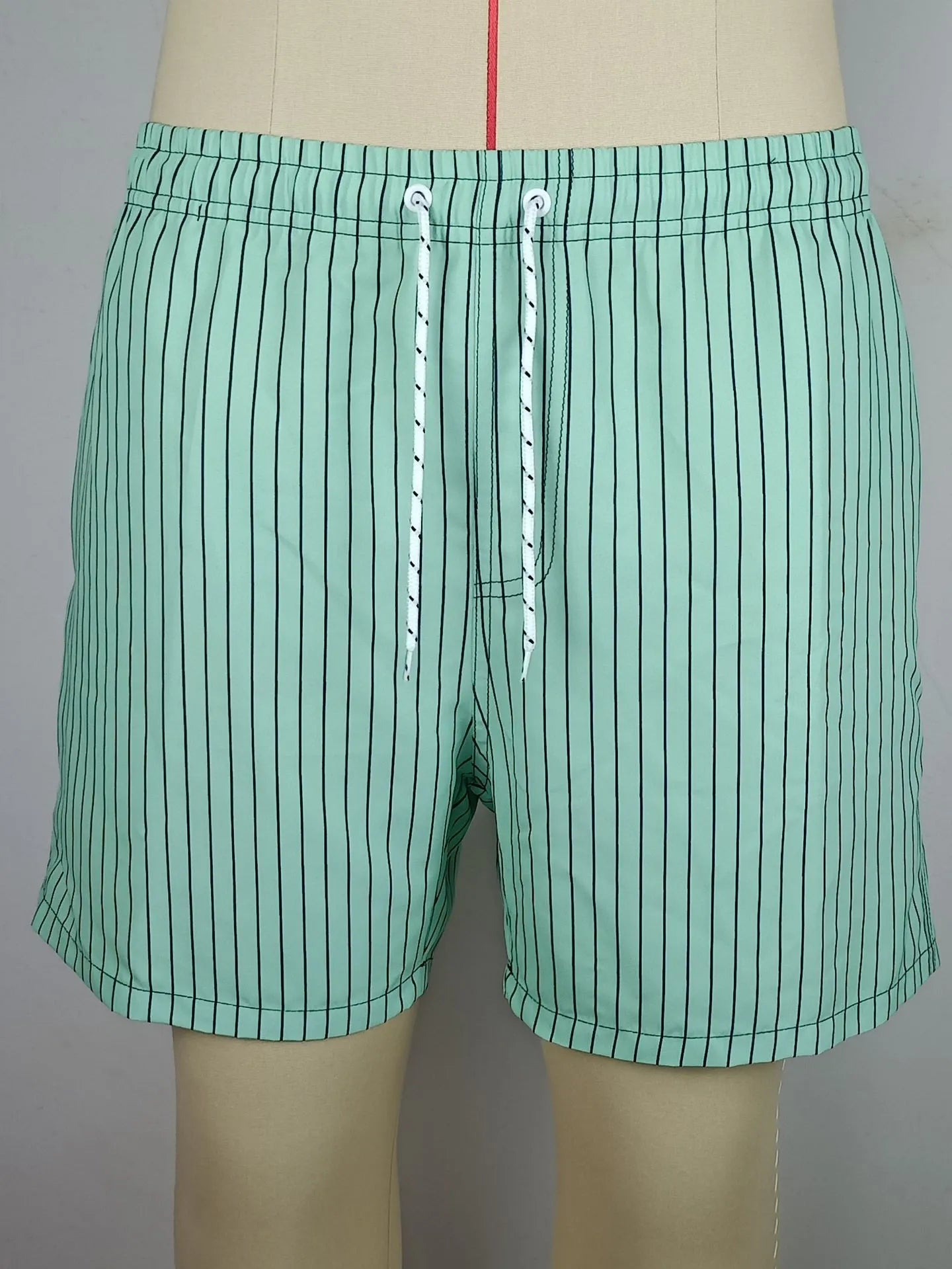 Polyester striped beach shorts with straight leg opening in navy blue, grey, khaki, or light blue colour options