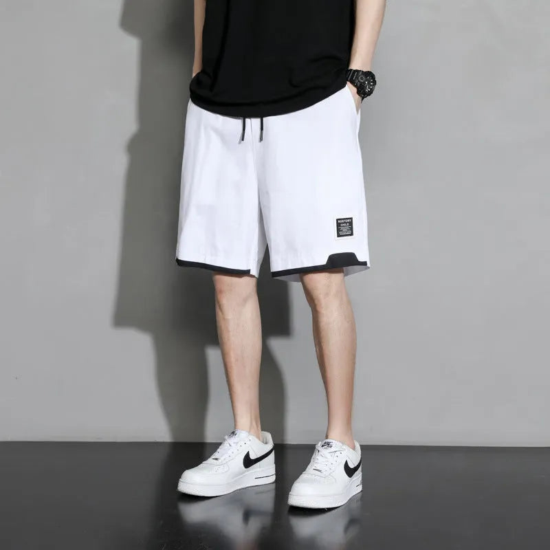 Boys' plus size cotton shorts in overalls style, shown in black, khaki and white.