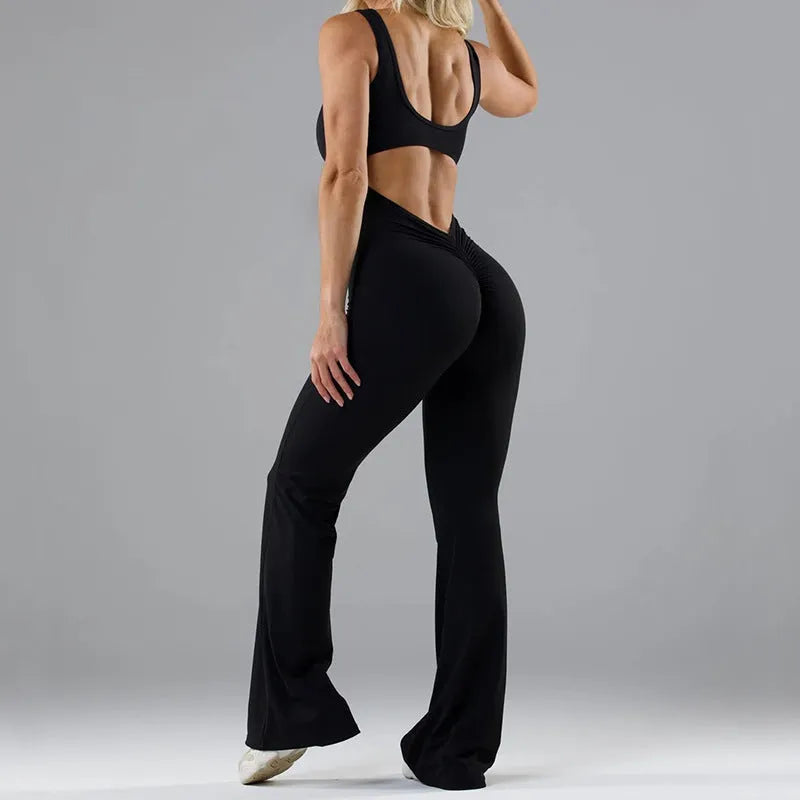 Women's black milk silk yoga bodysuit with seamless design and mid waist.