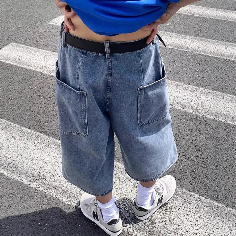 Men's blue washed denim cropped pirate shorts with a high waist and straight legs.
