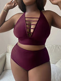 Plus size black halter bikini with adjustable cross straps and high waist briefs