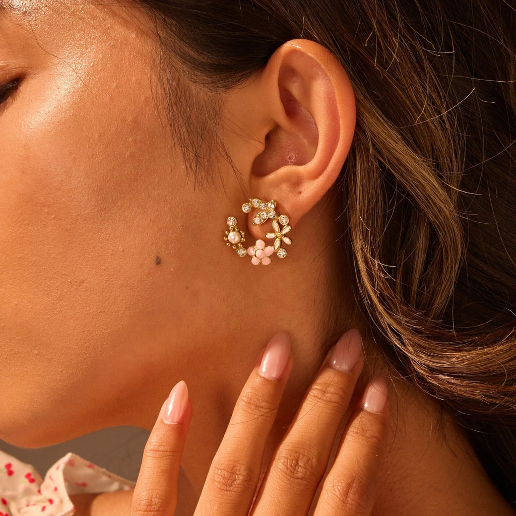 Women's floral stud earrings with petal design in electroplated finish on stainless steel