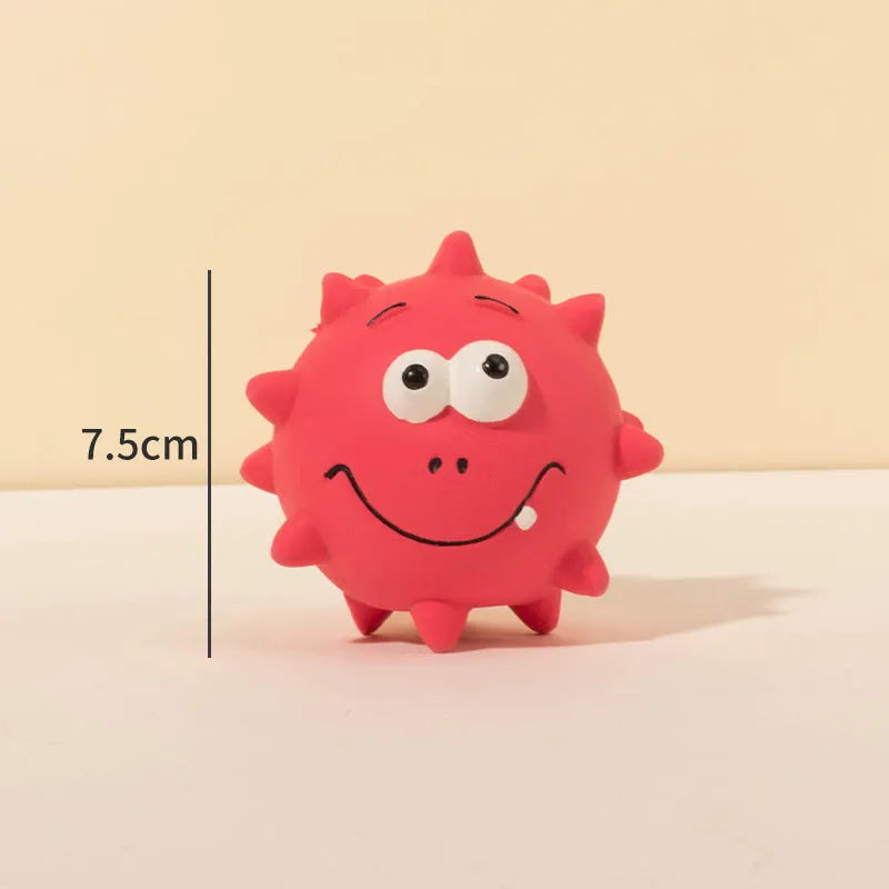 Four coloured squeaky dog balls with cute faces, made from natural latex rubber for safe chewing