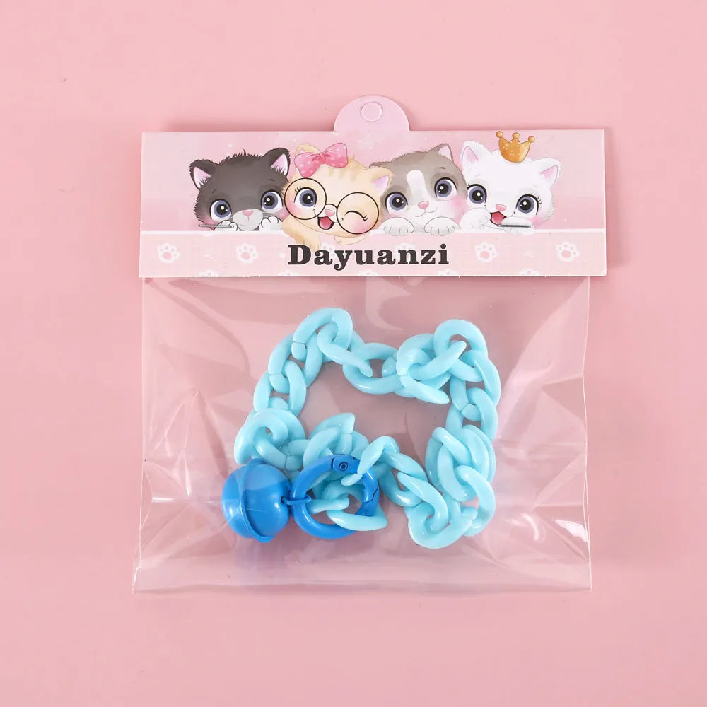 Plastic monochrome chain pet collar shown in chain blue, pink, and mixed colours for S and M sizes.