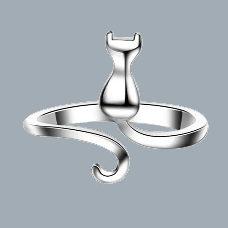Platinum colour alloy cat face open ring with adjustable opening on white background