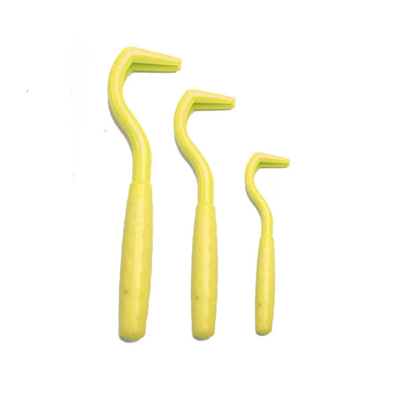 Set of three pet tick removal hooks in various colours for dogs