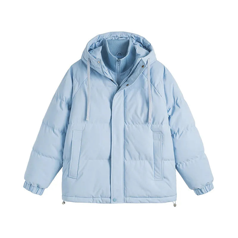Loose beige cotton-padded jacket with side seam pockets on a hanger