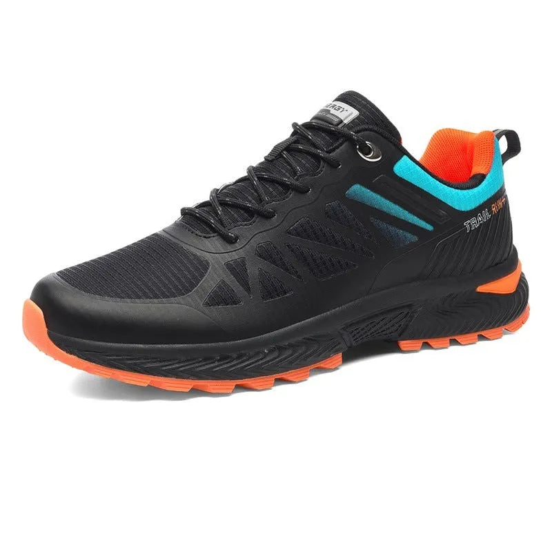 Men's black and orange mesh outdoor running shoe with round toe and flat heel on a rubber sole.