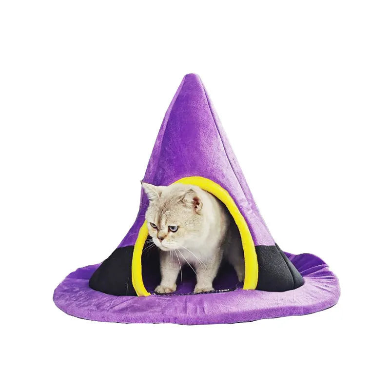 Purple cloth Halloween witch hat shaped cat bed measuring 60 by 45 centimetres