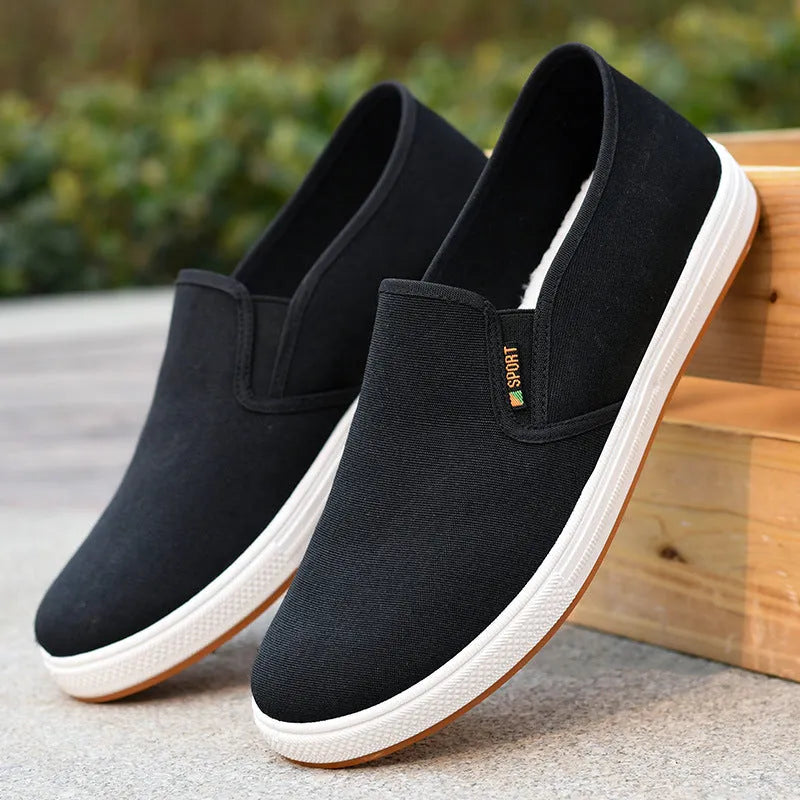 Men's black and blue slip-on canvas cloth shoes with round toe and shallow mouth design