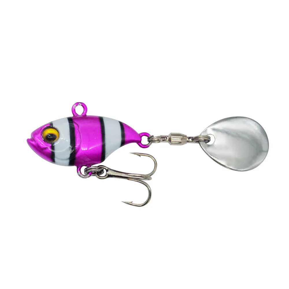 Metal sea fishing lure with rotating sequins shown in multiple colour options including zebra orange and gold.