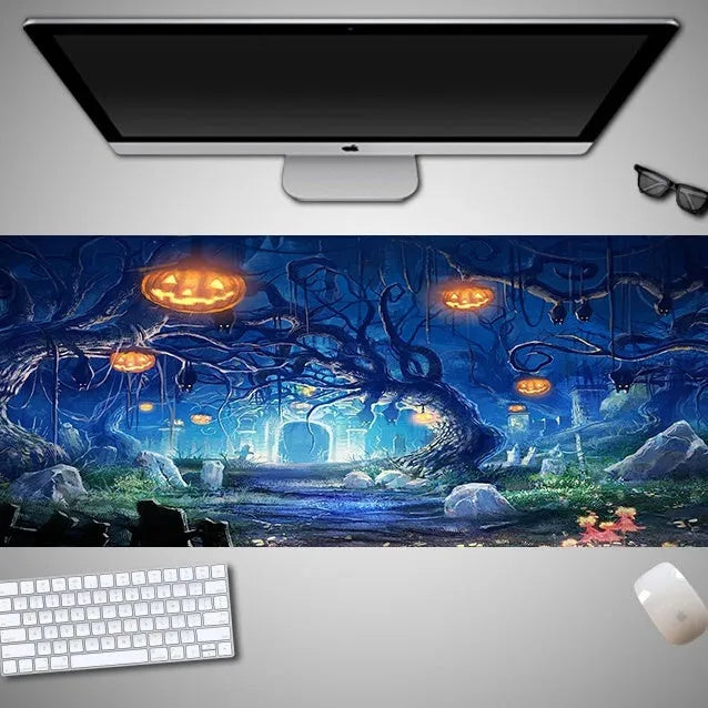 Large Halloween-themed computer mouse pad with graphic design on a desk