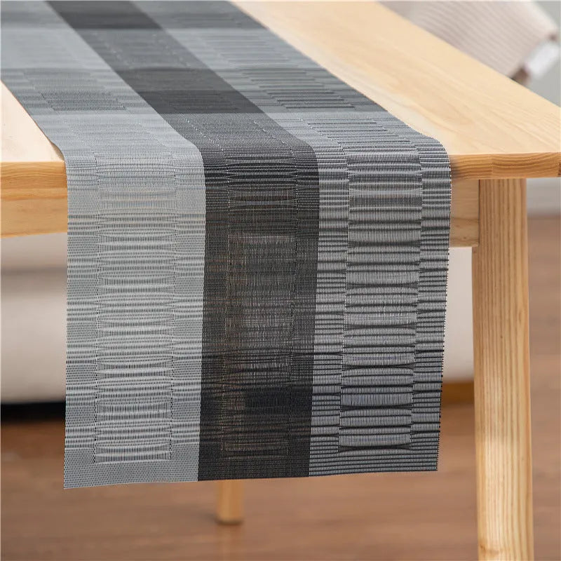 PVC non-slip dish mat in modern simplicity style protecting a wooden dining table