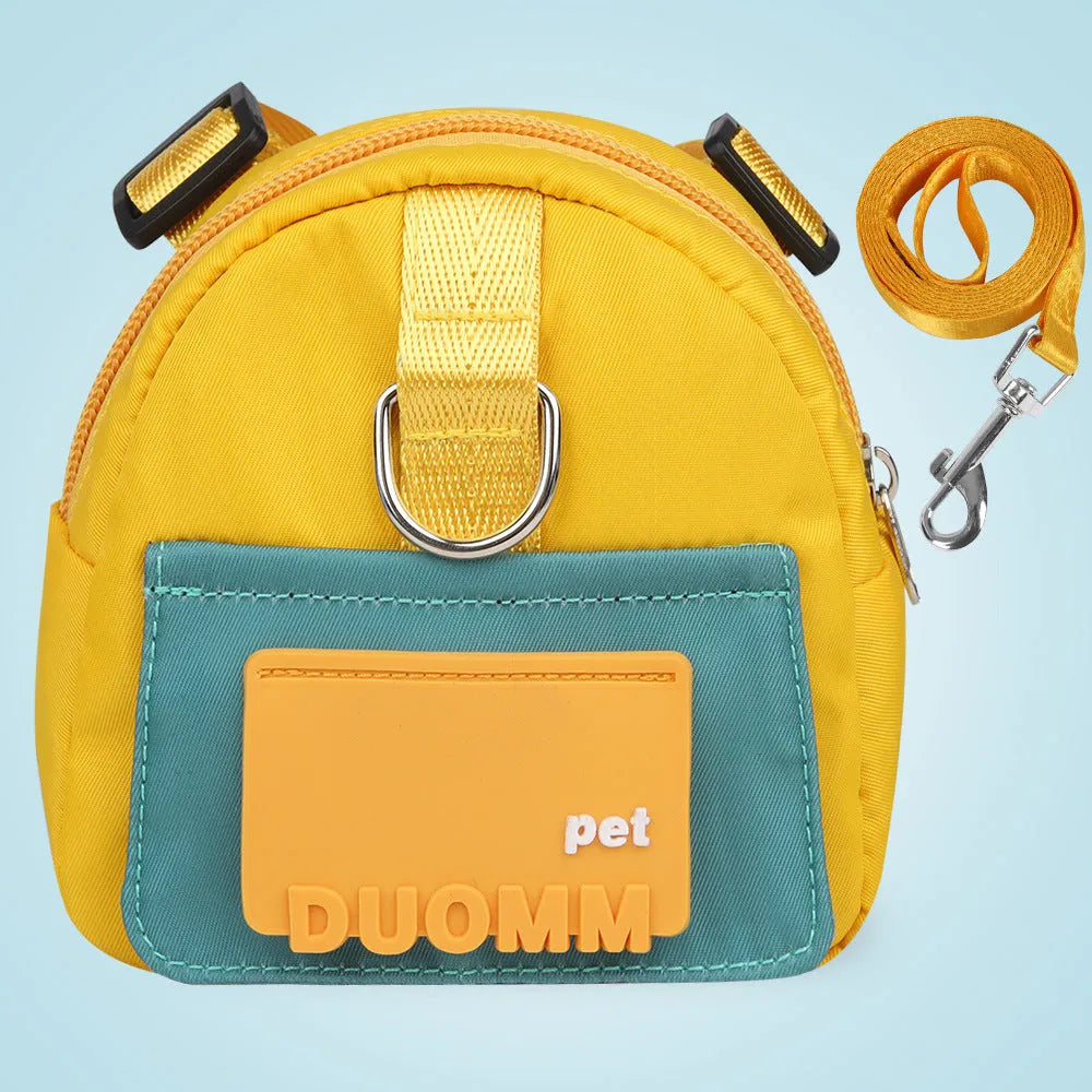 Blue adjustable dog backpack harness with storage compartments and a tow rope, shown on a medium-sized dog.