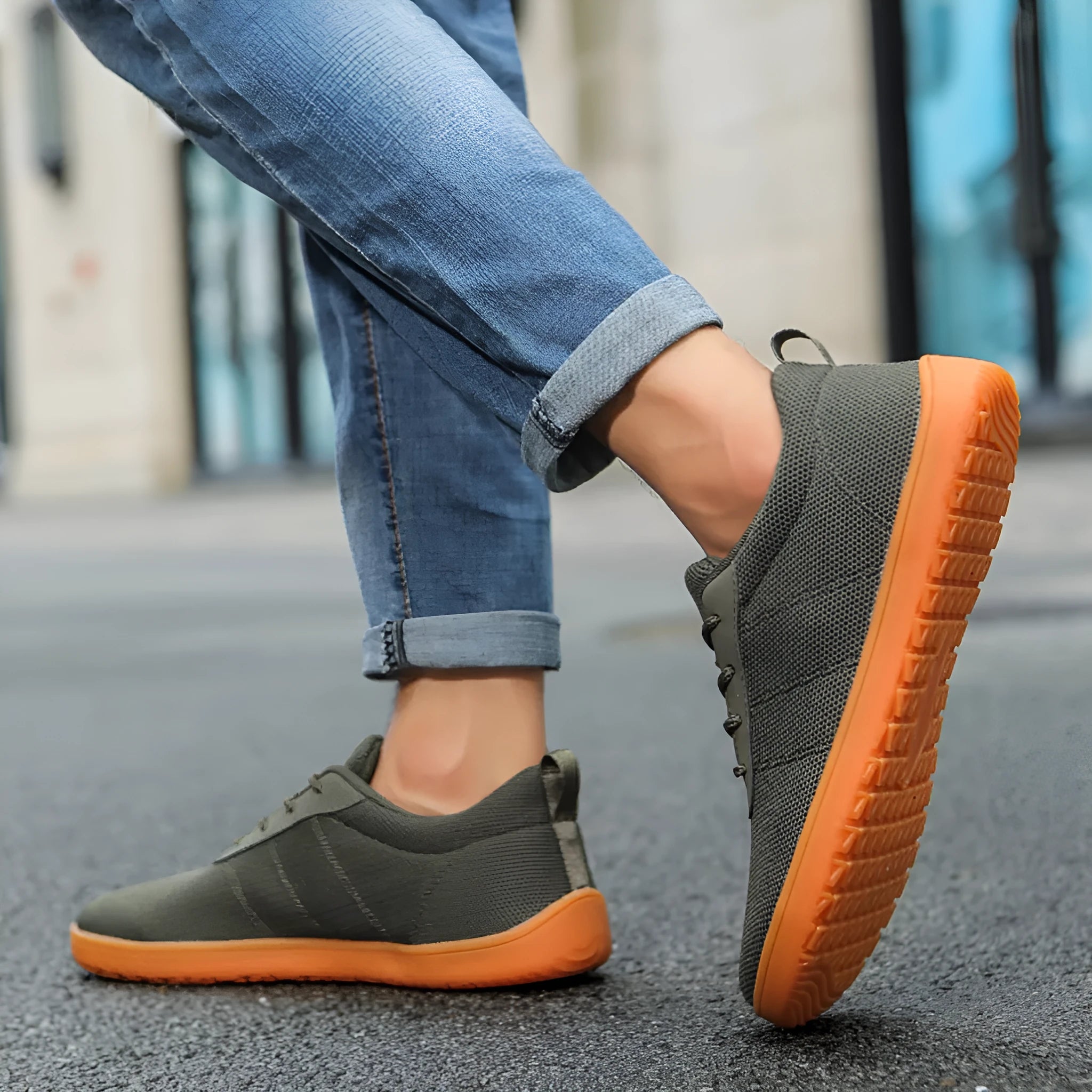 Men's low top walking shoes in Flyknit with non-slip rubber sole, shown in black colour with lace-up front.