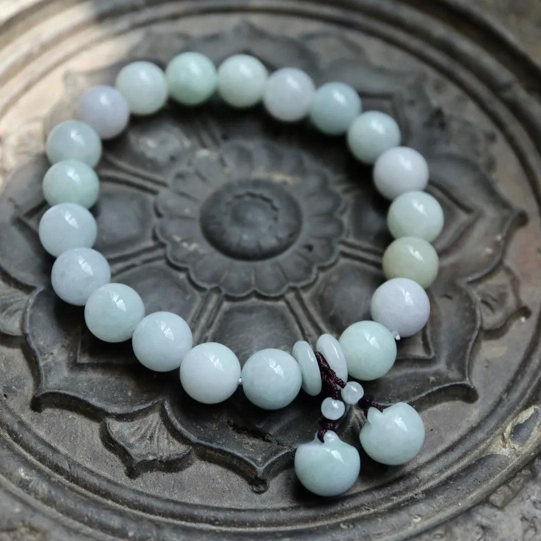 Natural jade bracelet with geometric hanging design and Buddhist elements including Maitreya Buddha motif
