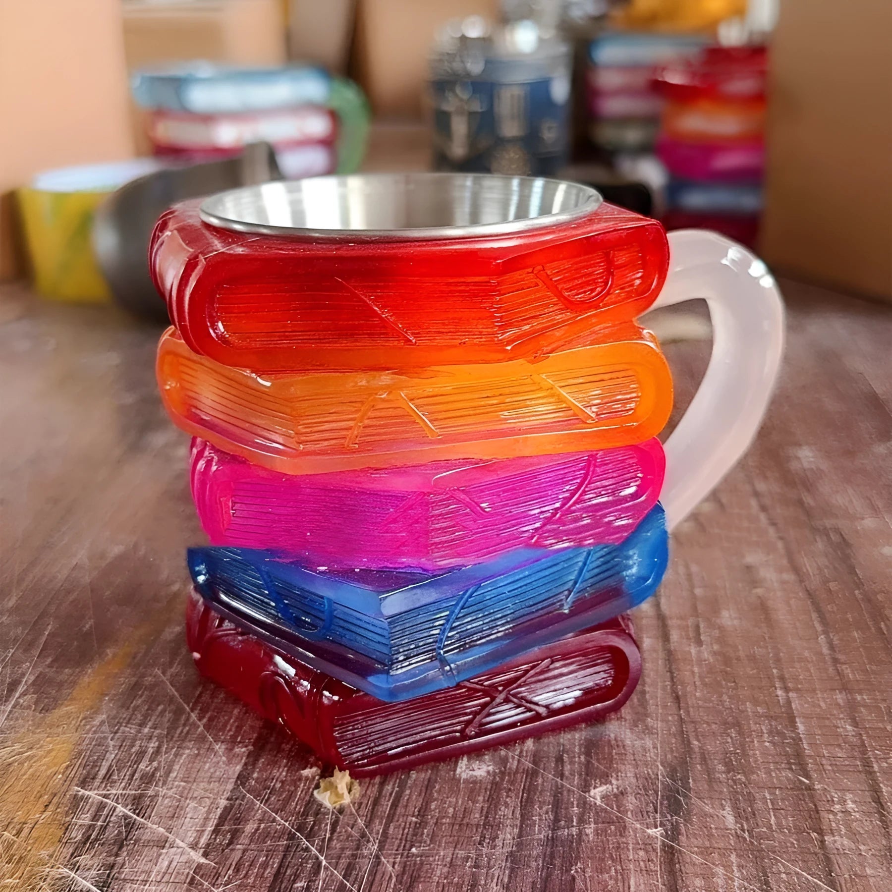 A synthetic resin coffee cup ornament with a book mark theme, shown in Library and Pattern style options.