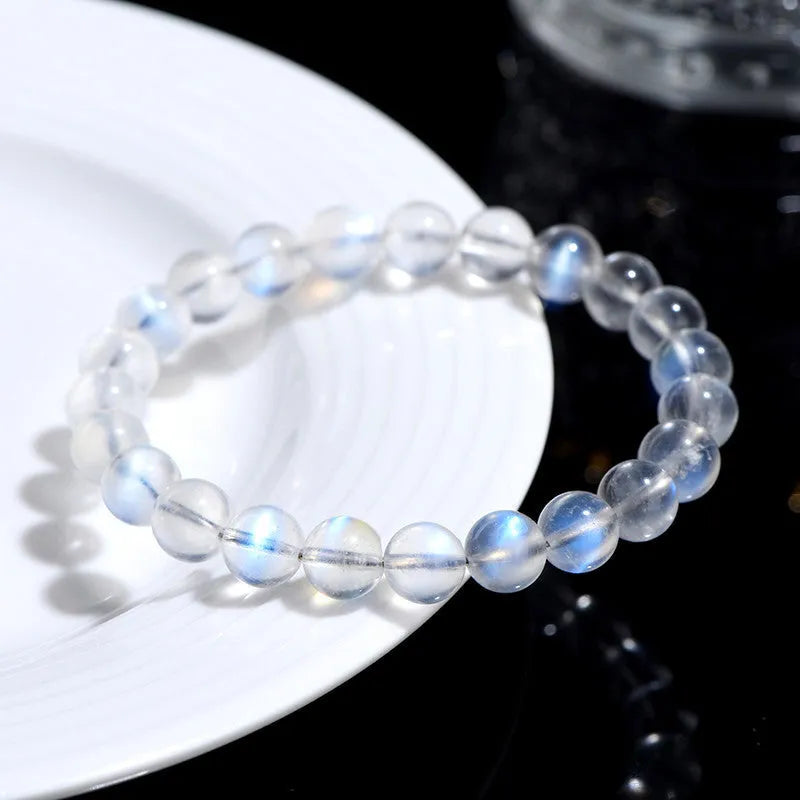 Natural cream body blue moonlight crystal bracelet showing crystal elements and simple construction