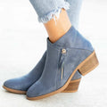 Women's suede ankle boots with side zip and chunky heel in beige, black, blue, or orange.