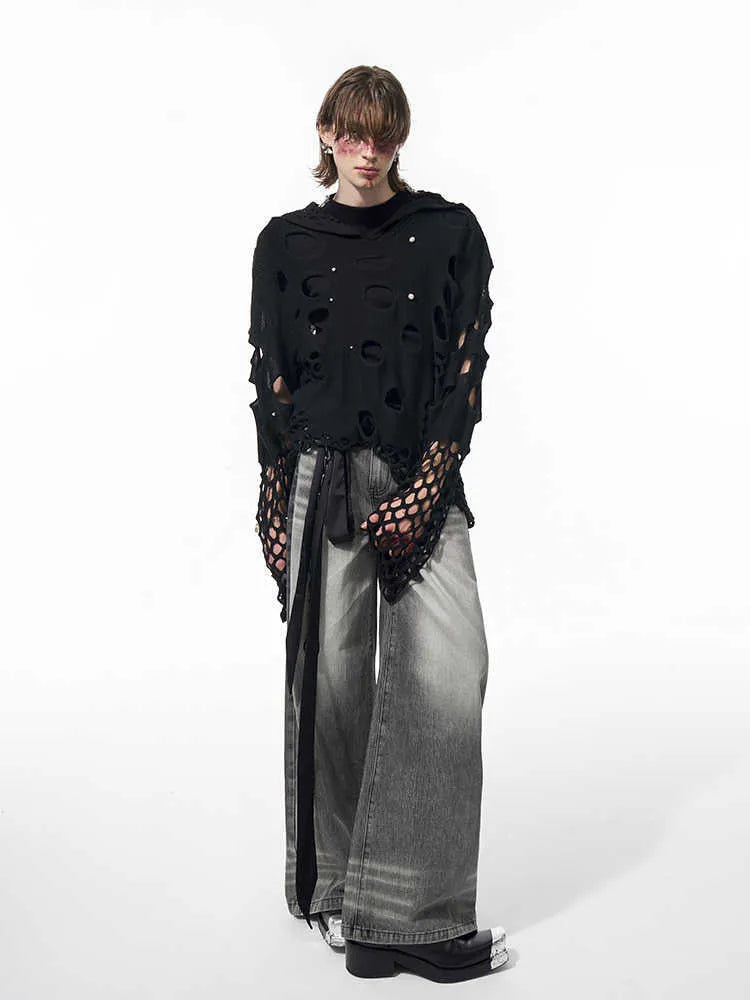 Men's black pullover hoodie with hollow-designed hood and pearl decorations on the front.