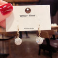 Geometric rose detail zircon earrings for women in copper, available in multiple colours.