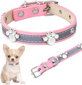 Reflective soft PU leather dog collar with metal paw-shaped rivets and adjustable buckle on a size chart.