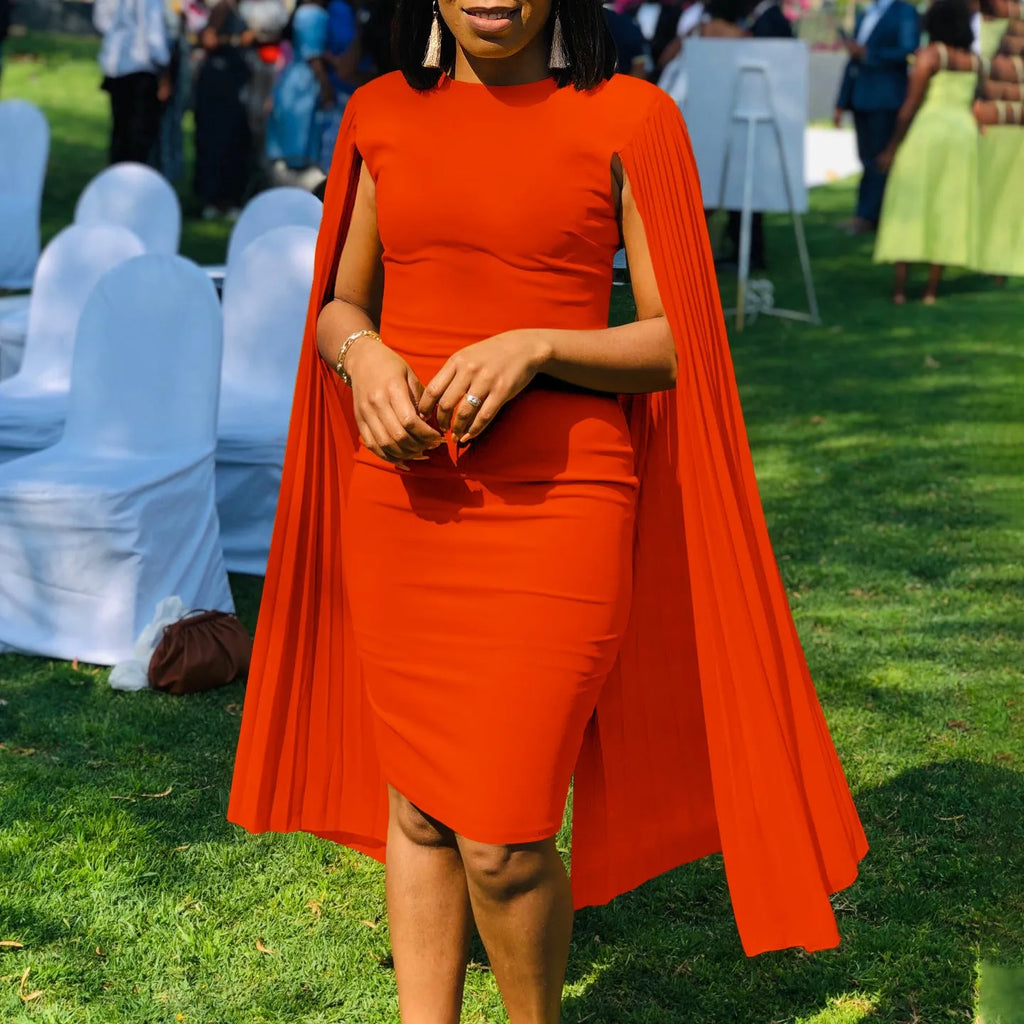 Long sleeve high waist evening gown with a round neck and pleated shawl detail.