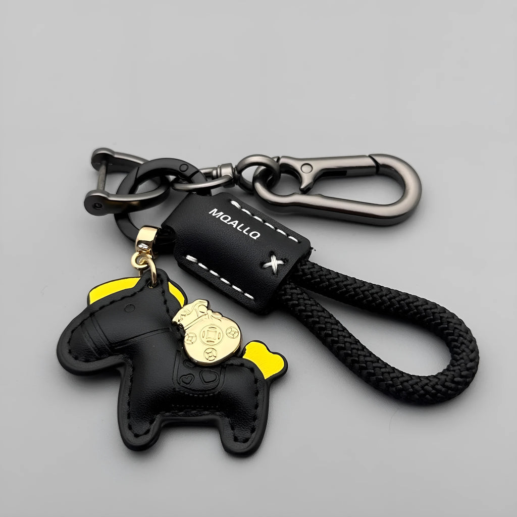 Handmade brown cowhide car key pendant with green flanelle rope and a metal buckle.
