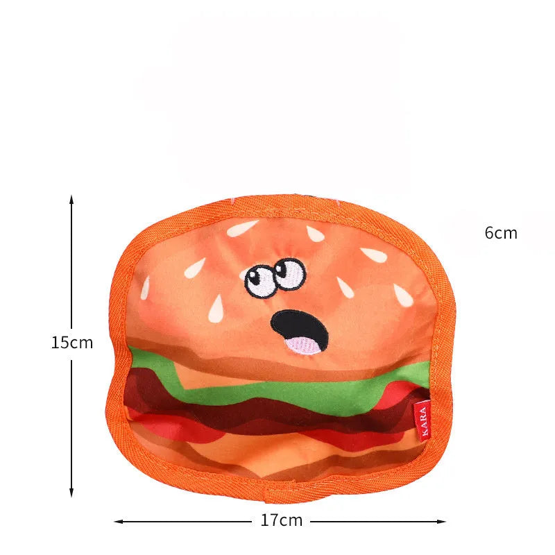 Crinkle and squeaky dog toy in hamburger, fries, hot dog, and pizza shapes.