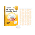 Close-up of a microdart wart removal patch and a pack of acne patches on skin tone background.
