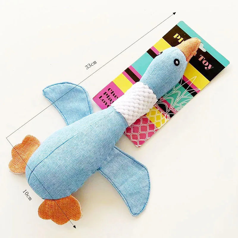 Green blue or grey durable plush duck dog chew toy with squeaker, 33 cm long.