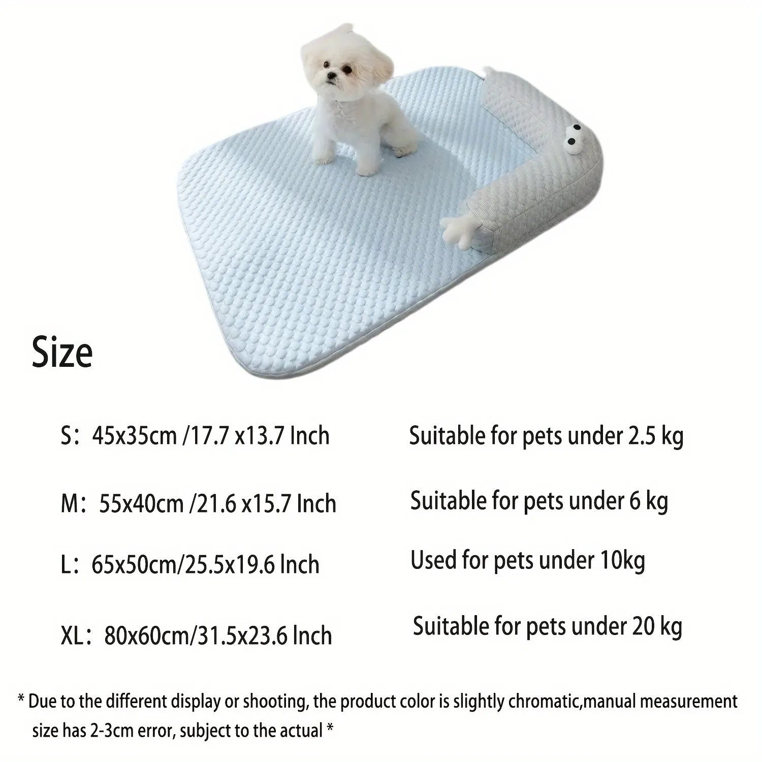 Blue pet bed cushion with a big-eyed monster design on a wooden floor.