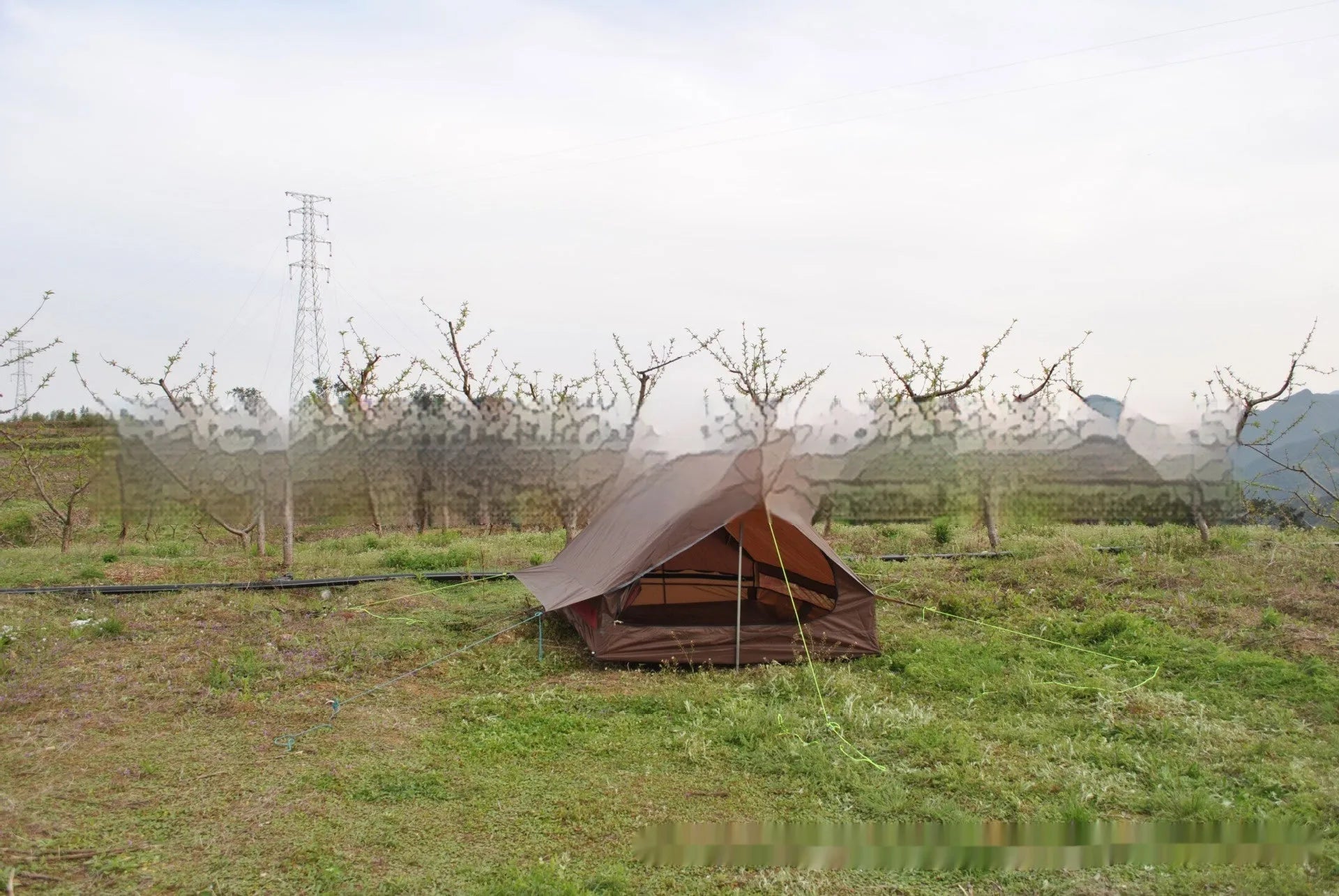 Brown or white A-line cabin tent using hiking canes for support with dimensions 210x150x110cm