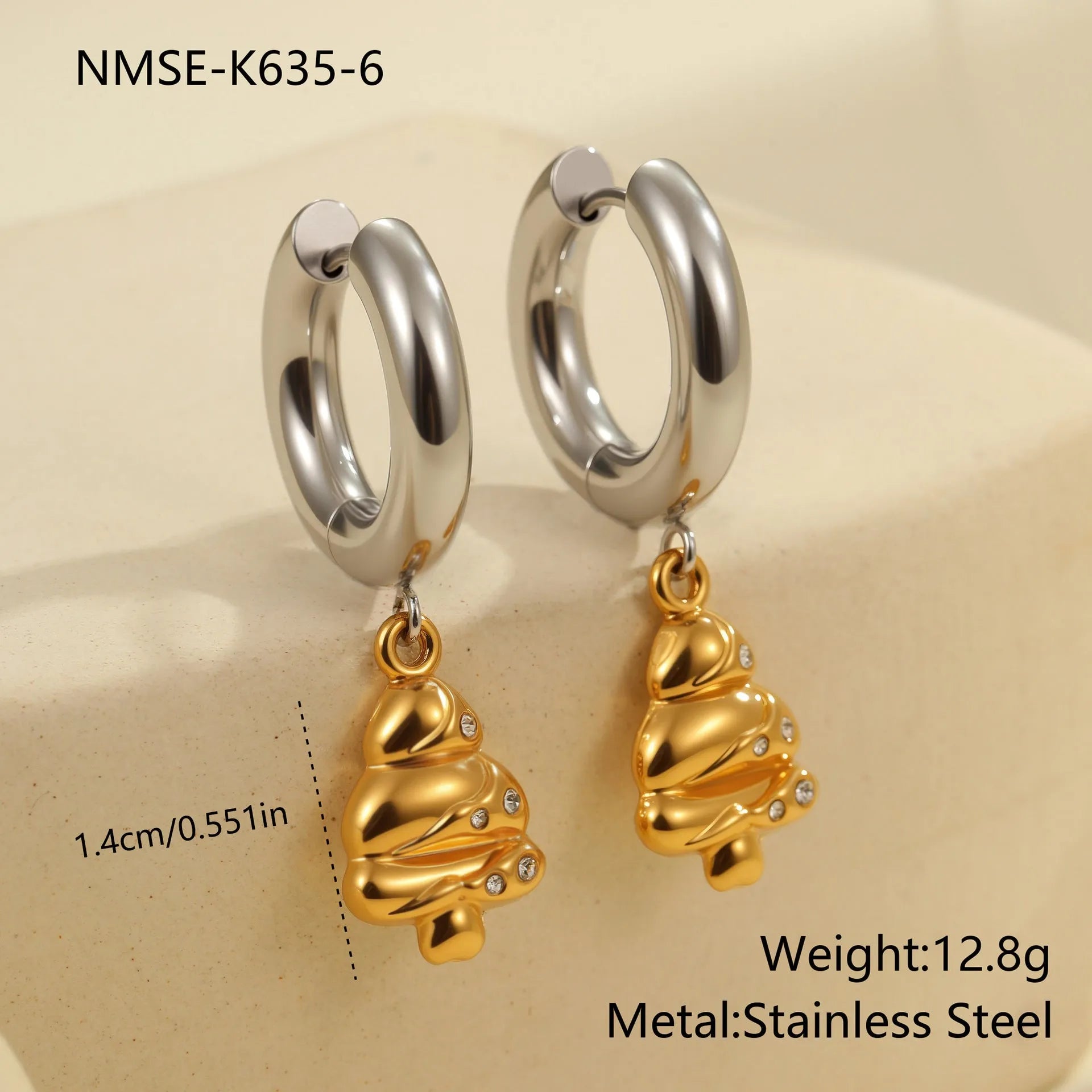 Gold Christmas tree earrings with heart and star shapes made from stainless steel with 18K plating