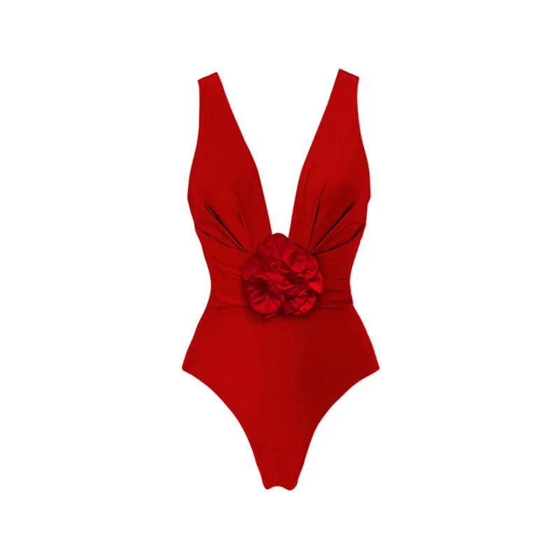 Red floral print women's one-piece swimsuit with V-neck halter and detachable long skirt on a model.