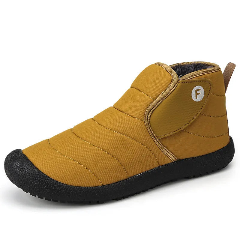Men's thick cotton snow boots with a non-slip rubber sole in black, shown on a hard surface.