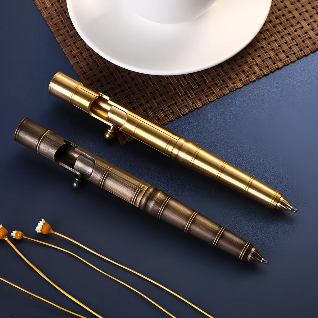 Retro brass tactical pen with press bolt-action mechanism and cylindrical metal barrel