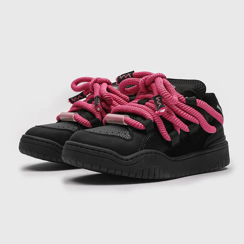 Low-top unisex casual shoes in denim blue with white rubber sole and lace-up front.
