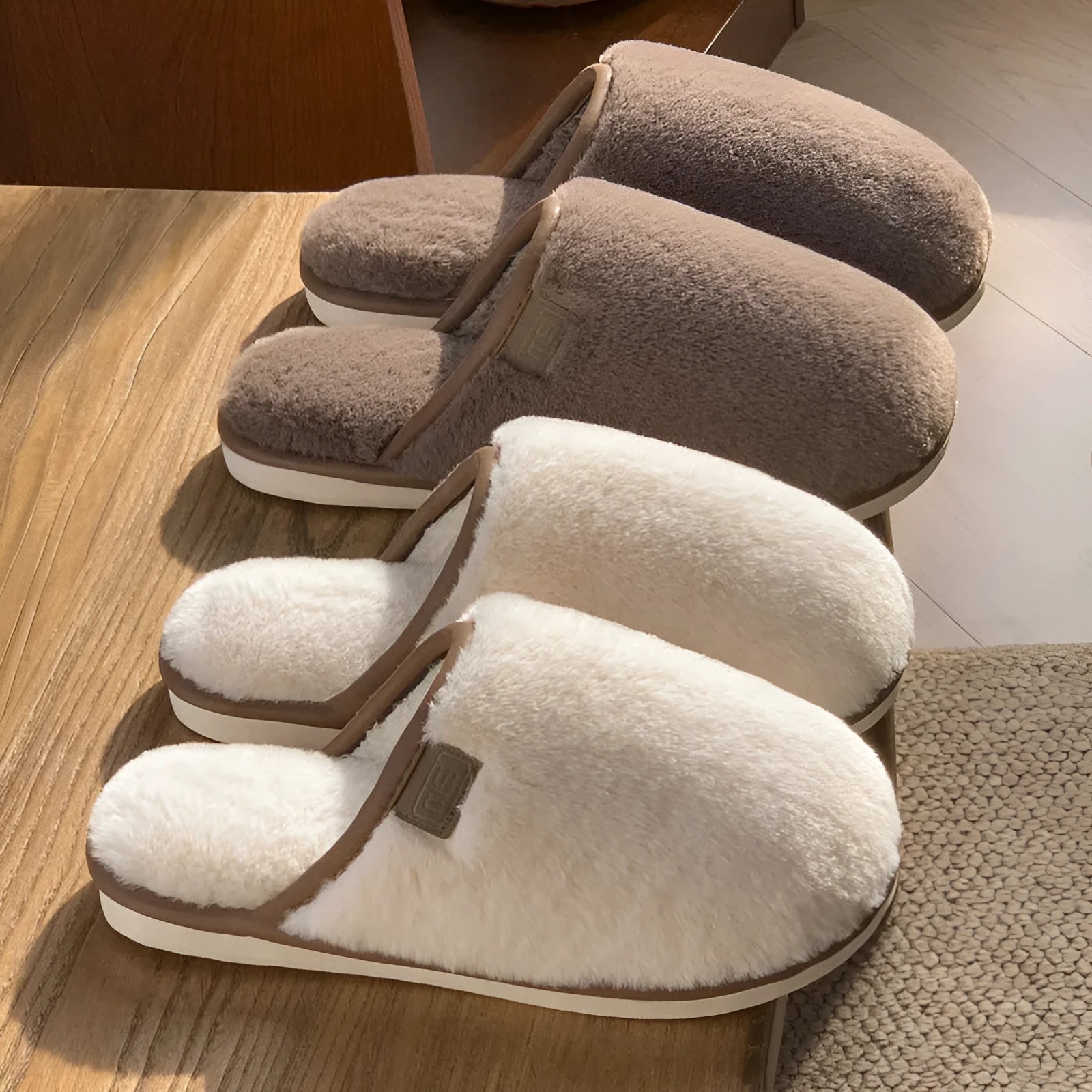 Solid colour PVC winter plush house slippers with car stitching detail on a non-slip sole.