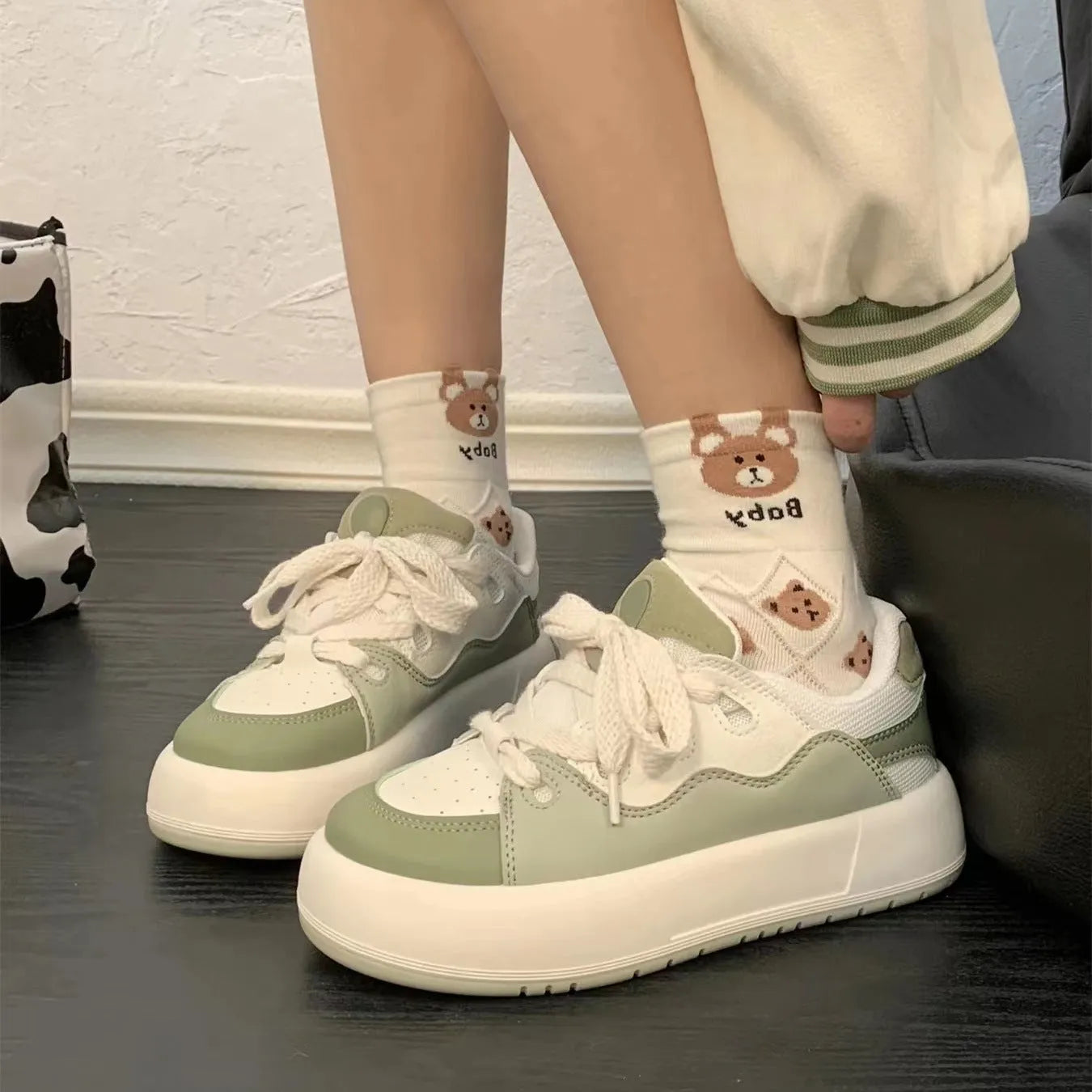 Women's green casual shoes with a round toe and flat heel, made from breathable PU mesh.