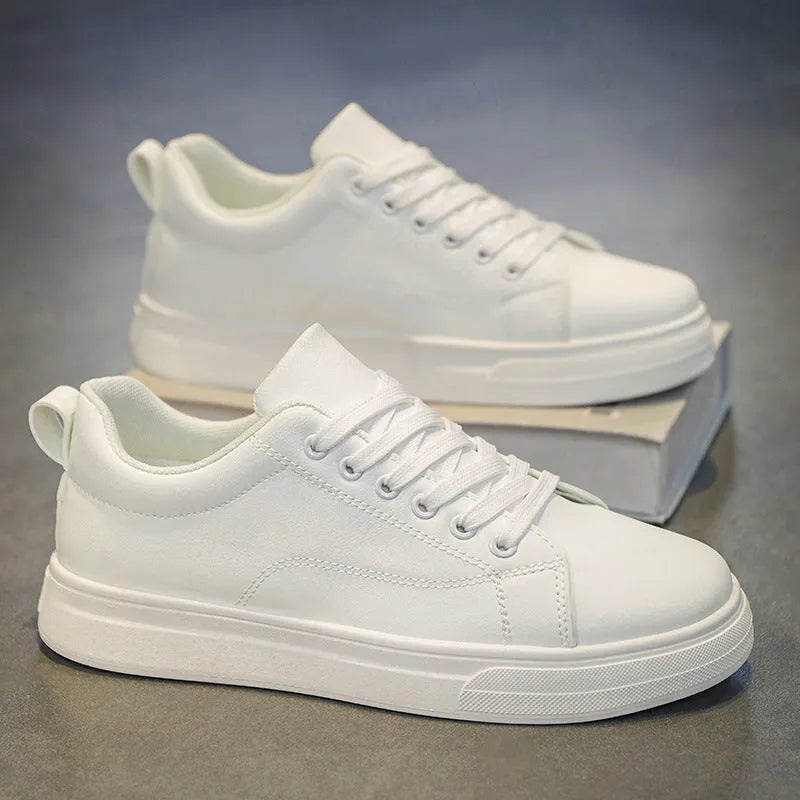 Men's Korean-style low-top sneakers in all black colour with round toe and rubber sole