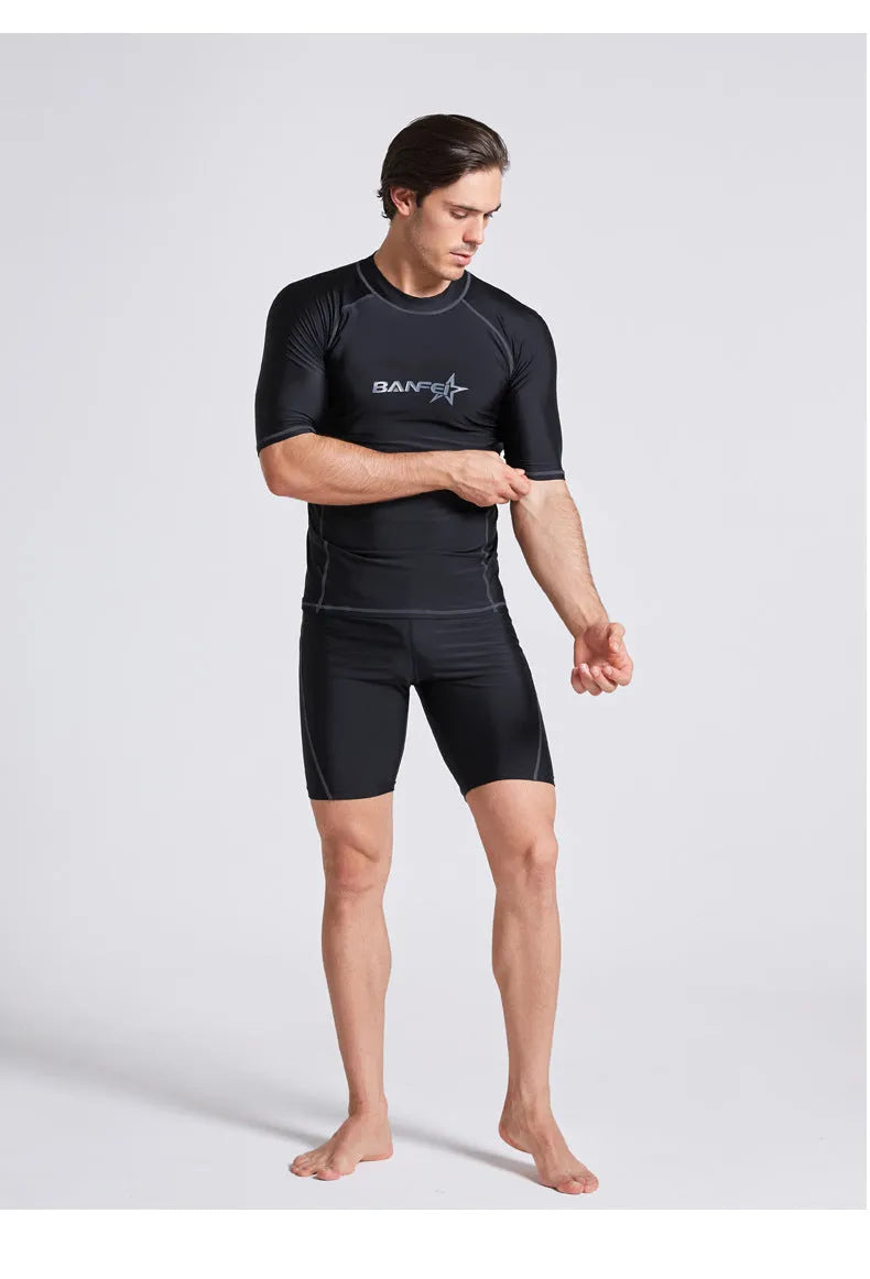 Men's quick-drying half sleeve swimsuit set in nylon for snorkelling and surfing activities