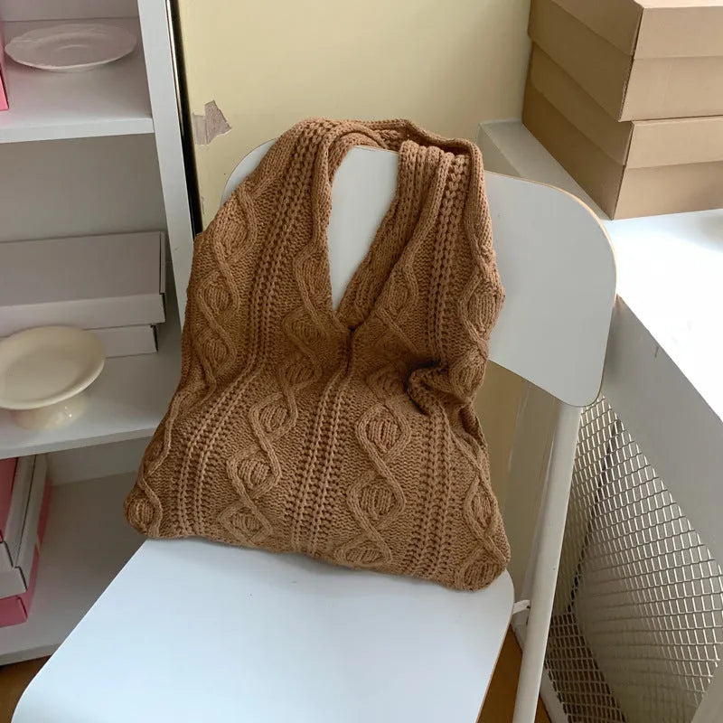 Retro style hollow knitted women's tote bag in a solid colour with double shoulder straps