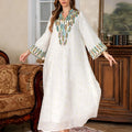 White floor-length Arabic robe for women with long sleeves, made from polyester fabric.