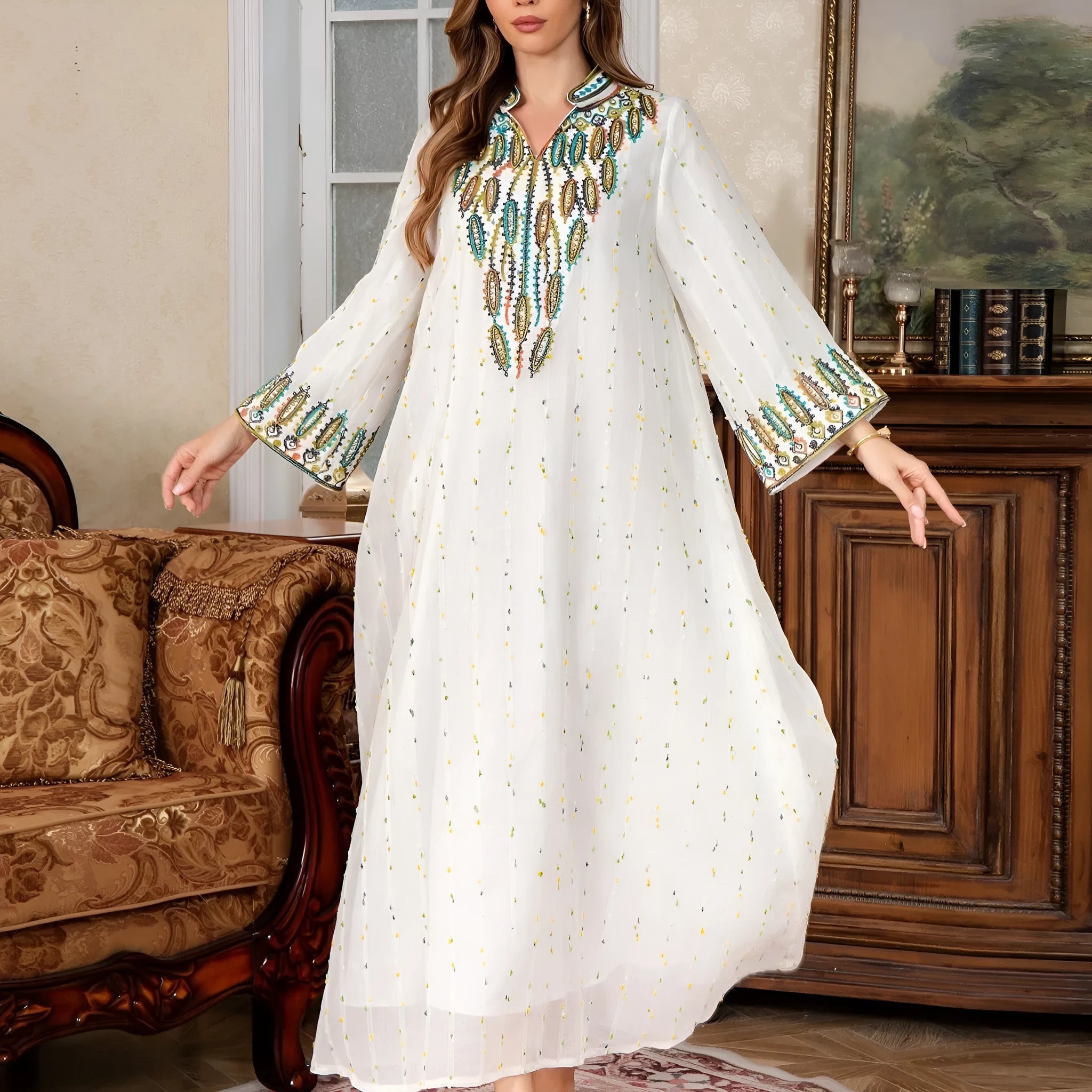 White floor-length Arabic robe for women with long sleeves, made from polyester fabric.