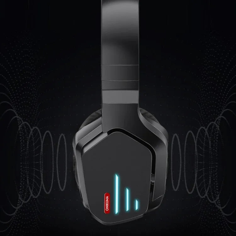 Luminous black wireless over-ear headphones with a headband, shown with a 3.5mm audio cable.