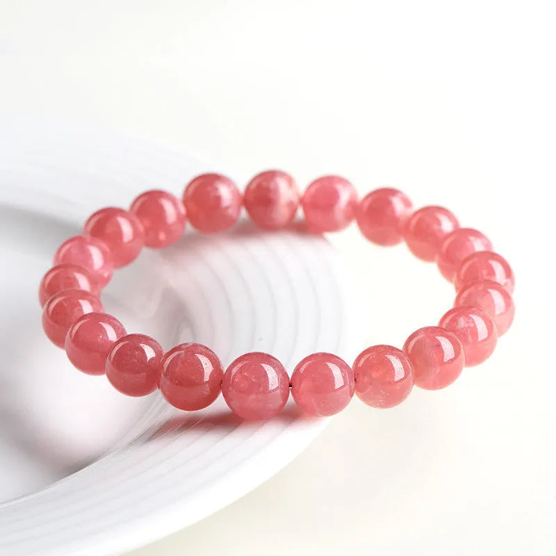 Crystal geometric bracelet with longevity lock detail in natural red stone pattern