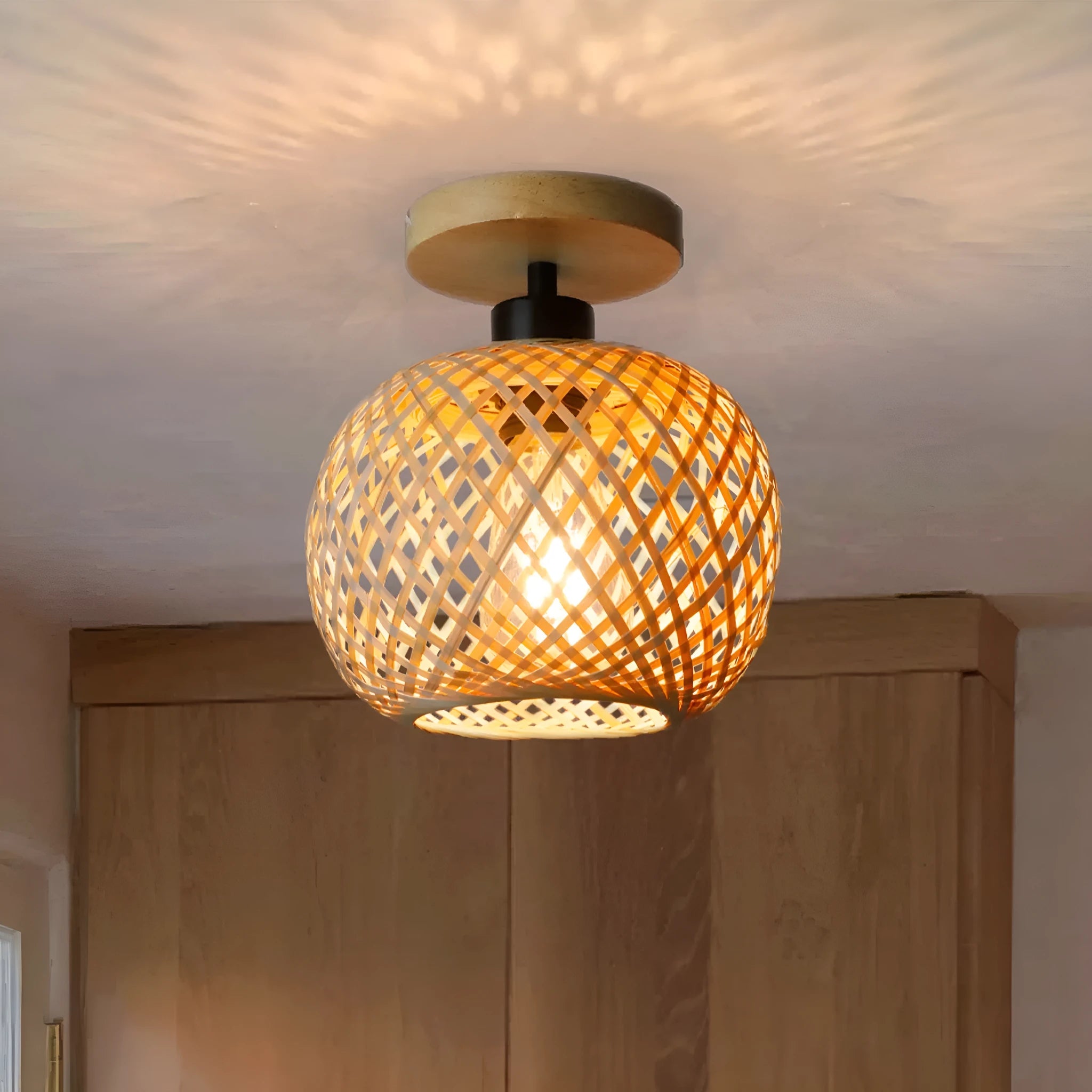 Japanese-style woven bamboo ceiling pendant light with a wood-colour finish, shown from below.