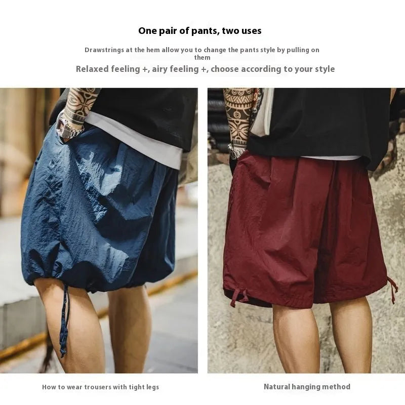 Men's Prussian blue embroidered nylon shorts with loose fit and fifth-pant length