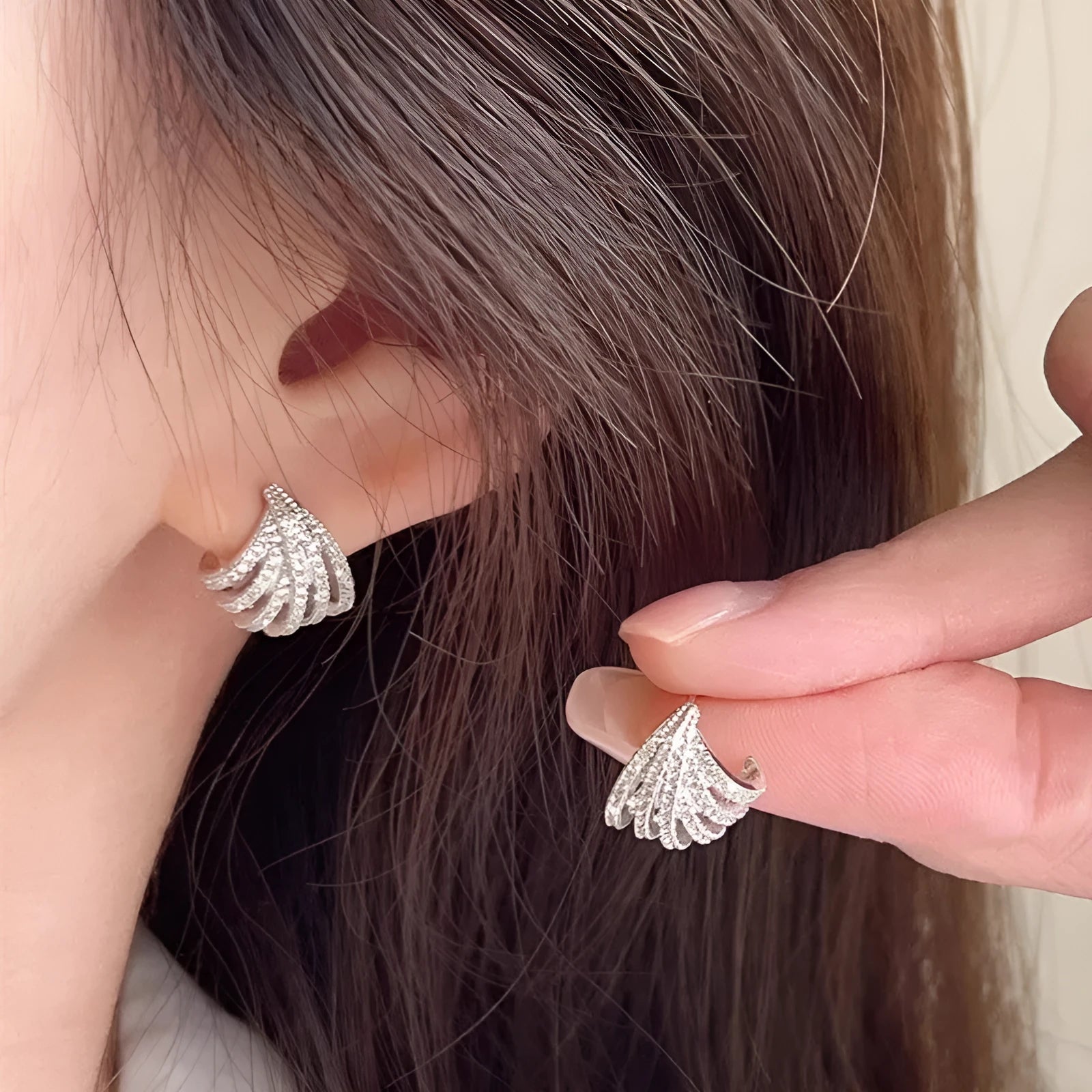 Women's geometric line design earrings with platinum electroplated finish on zircon material
